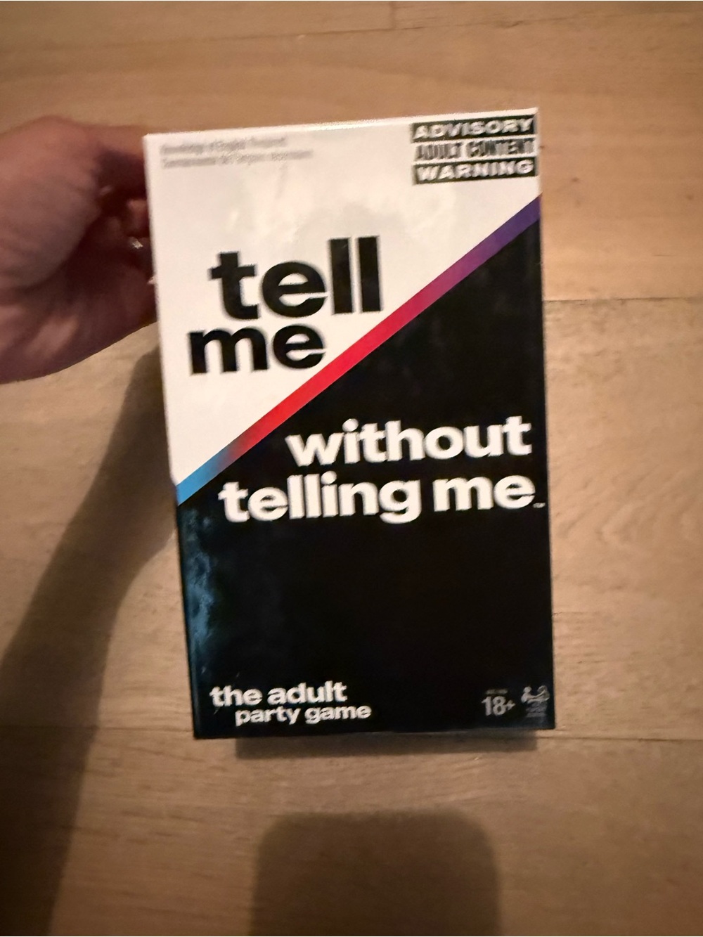 Tell Me Without Telling Me Party Game — Black & White Box with Accent Stripe